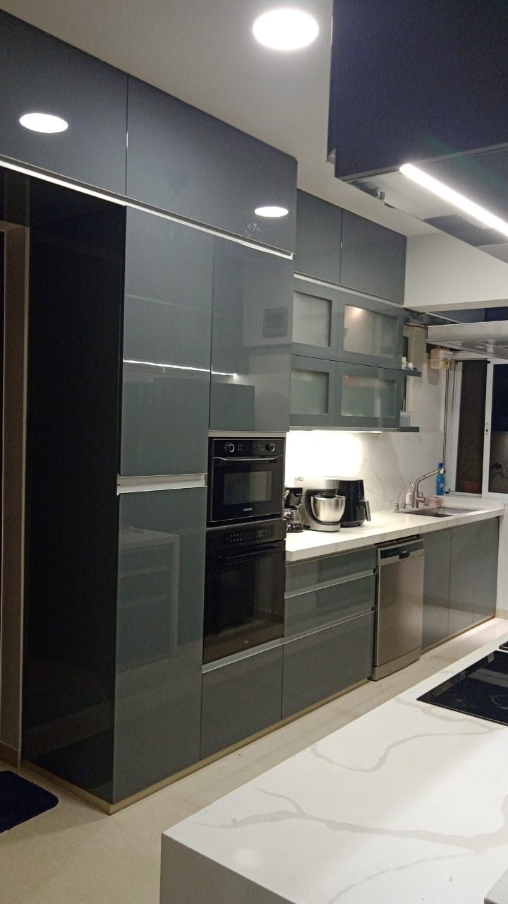 Tall grey PU-paint units with built-in oven
