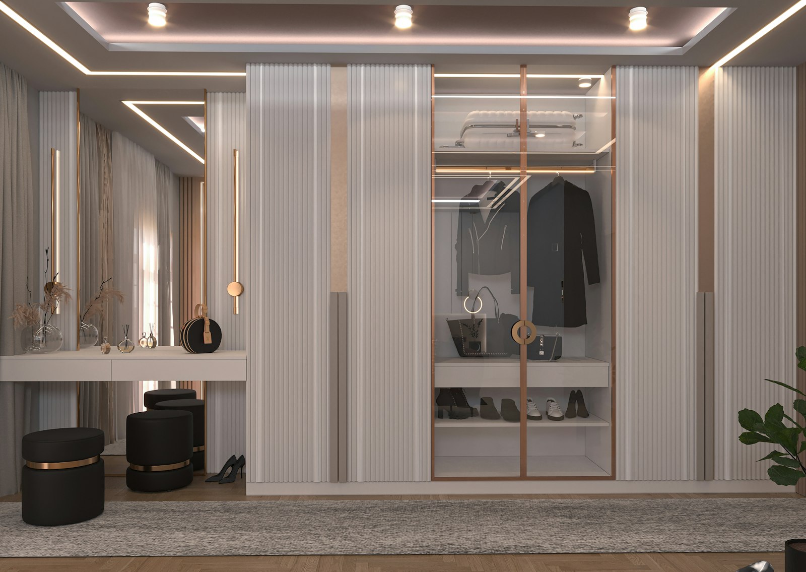 Full-wall fluted wardrobe with a bronze-framed glass centre section and a dressing unit