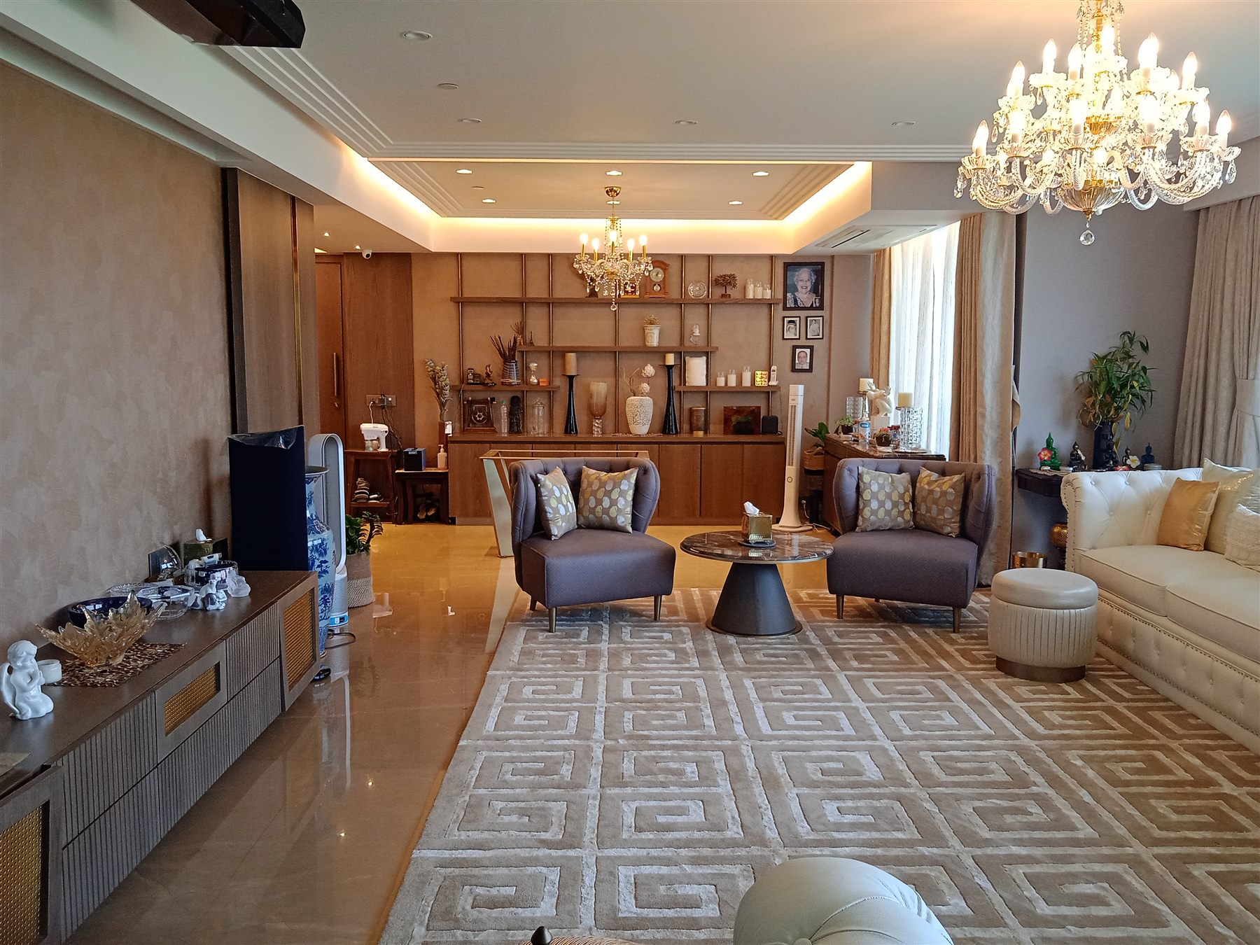 Living room with the display wall and dining beyond